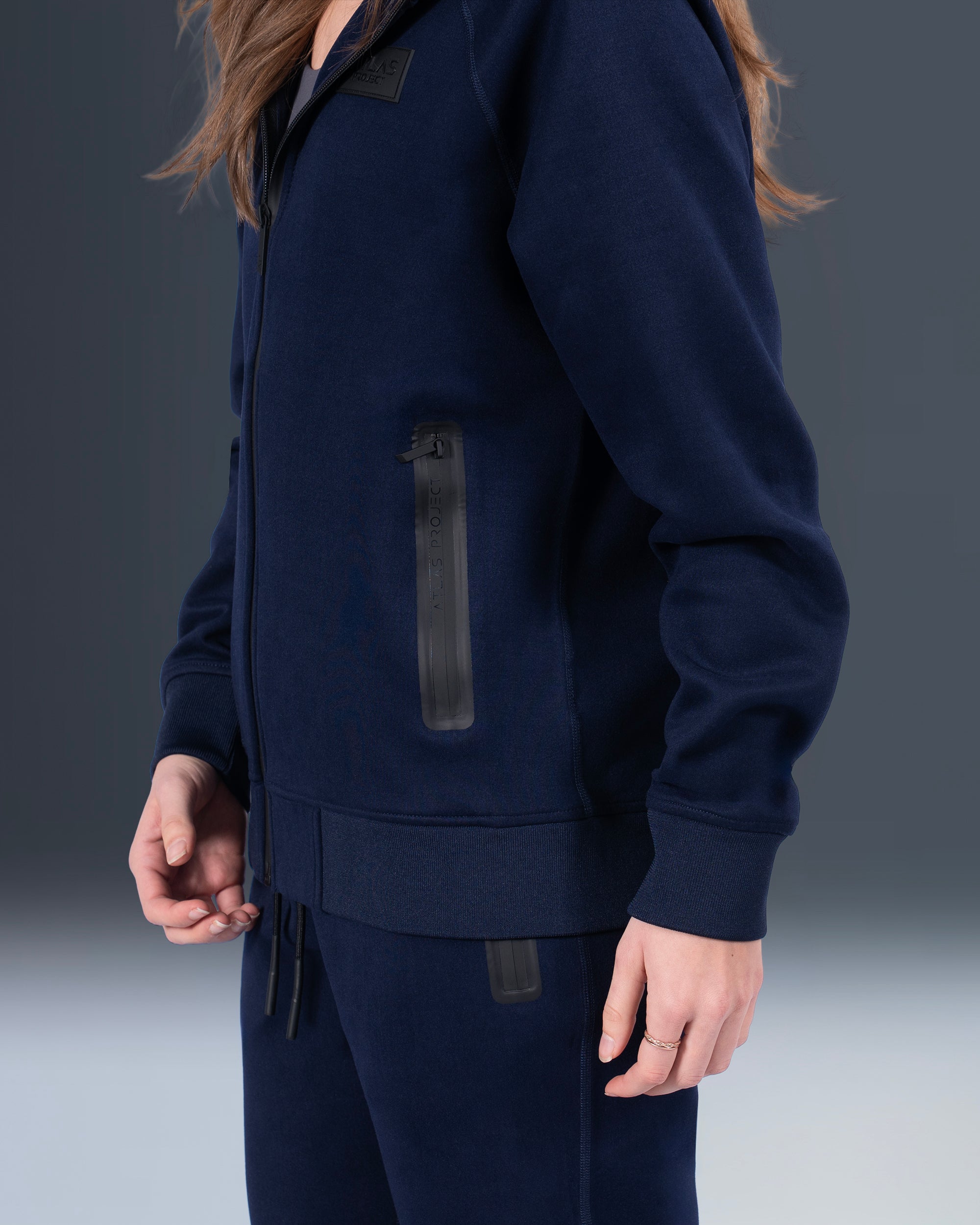 UNISEX PERFORMANCE ZIP CARDIGAN
