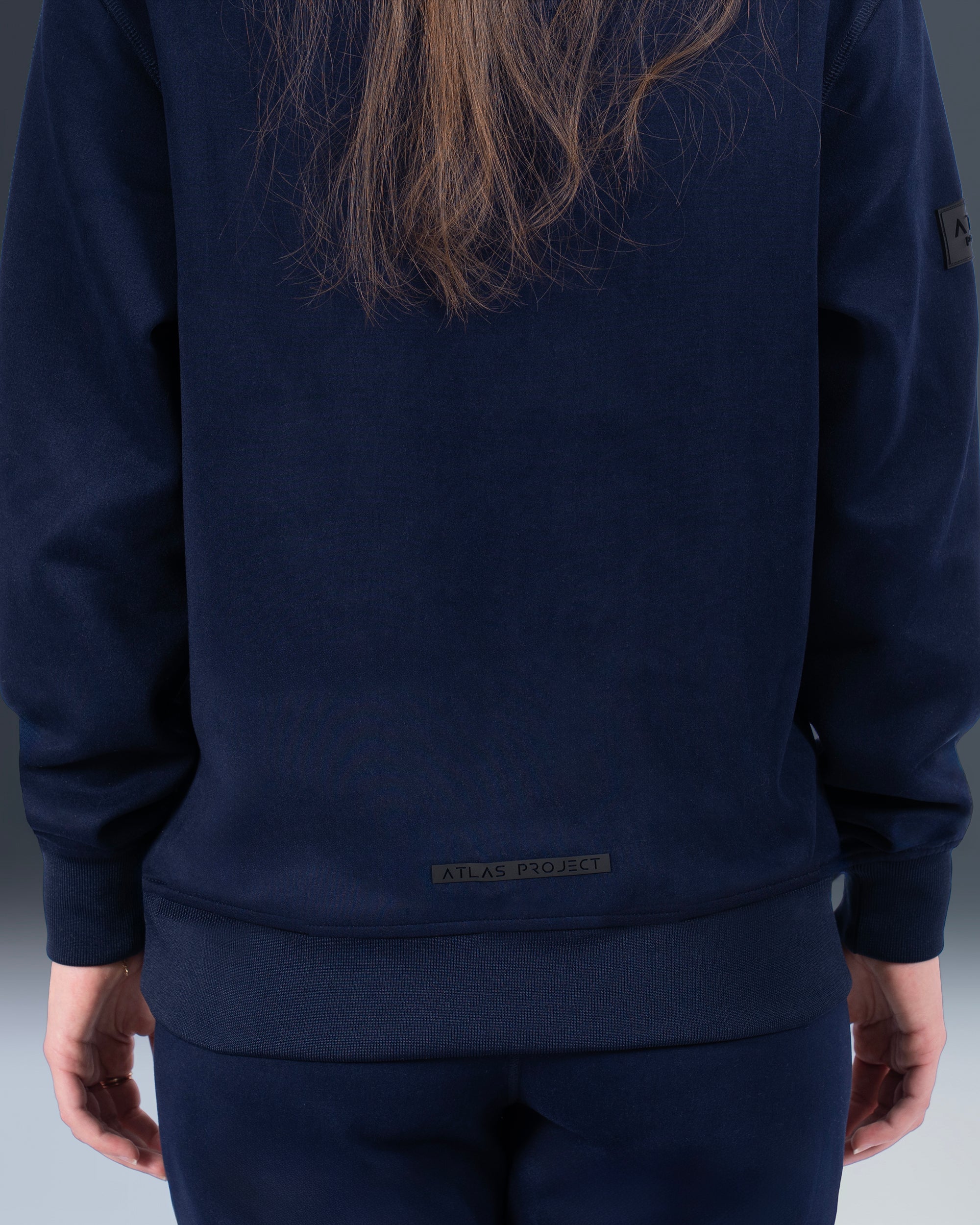 UNISEX PERFORMANCE ZIP CARDIGAN